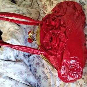 Red Shoulder Bag with Glossy Finish and Ruched Design